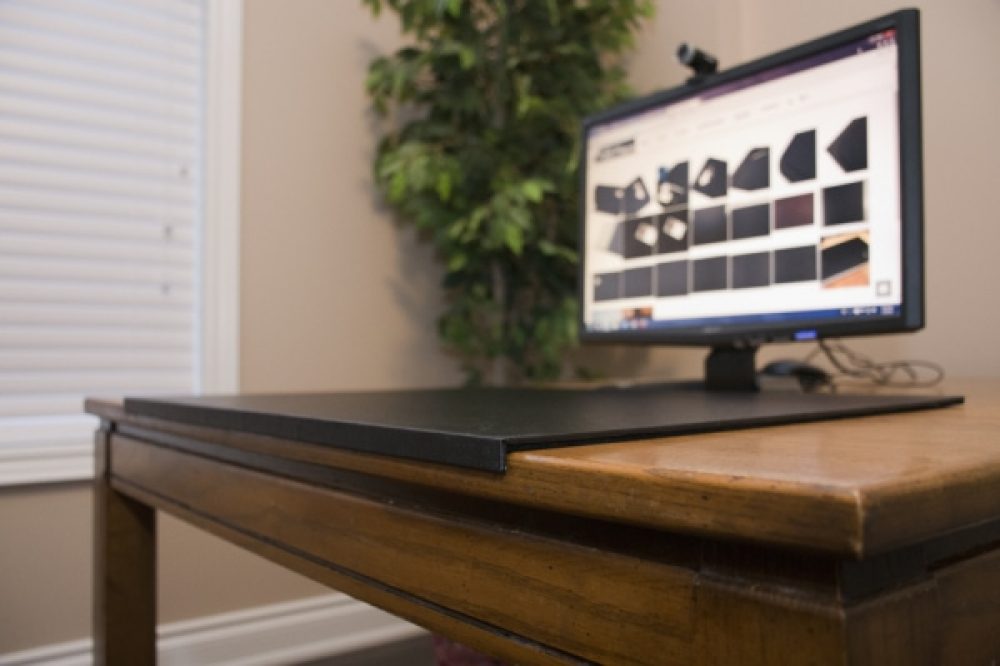 Angle shot of desk mat with edge protection black