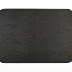 Black leather desk pad with slightly rounded corners