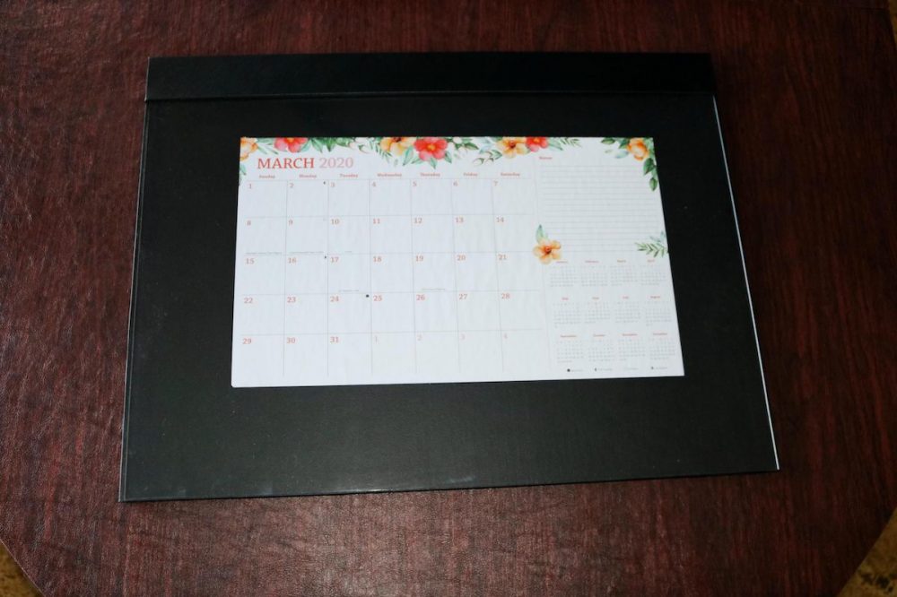 Desk pad with calendar and overlay